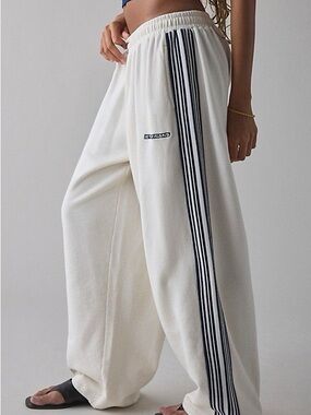 Urban Outfitters lets Fran’s Cream Wide-Leg Track Pants with Black Stripe